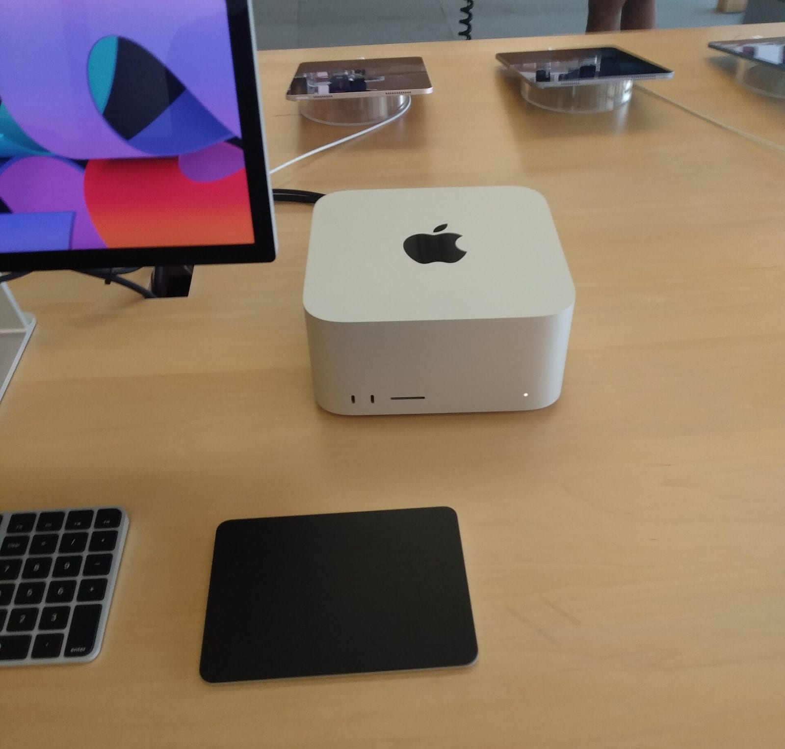 Mac Studio with Studio Display, Magic Keyboard, and Magic Trackpad in Apple Store